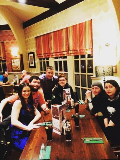 A family group around a table in a pub.